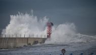 Waves brought by Typhoon Haishen crash into the breakwater in the eastern port city of Sokcho on September 7, 2020. The powerful typhoon lashed South Korea on September 7 after smashing into southern Japan with record winds and heavy rains that left four 
