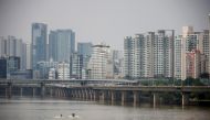A man enjoys wakeboard amid the coronavirus disease (COVID-19) pandemic at a Han River park in Seoul, South Korea, Sept. 10, 2020. REUTERS/Kim Hong-Ji/File Photo