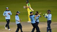 Cricket - Second One Day International - England v Australia - Emirates Old Trafford, Manchester - September 13, 2020 England players celebrate winning the match after the wicket of Australia's Alex Carey Pool via REUTERS/Shaun Botterill
