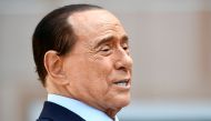 Former Italian Prime Minister Silvio Berlusconi speaks to the media as he leaves Milan's San Raffaele hospital, where he was being treated after testing positive for the coronavirus disease (COVID-19) and diagnosed with mild pneumonia, in Milan, Italy, Se