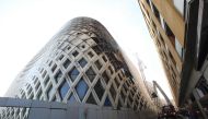 Lebanese firefighters douse the flames of a blaze that engulfed a landmark modern building, designed by the late world-renowned British-Iraqi architect Zaha Hadid, in central Beirut on September 15, 2020 AFP / ANWAR AMRO