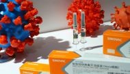 FILE PHOTO: A booth displaying a coronavirus vaccine candidate from Sinovac Biotech Ltd is seen at the 2020 China International Fair for Trade in Services (CIFTIS), following the COVID-19 outbreak, in Beijing, China September 4, 2020. REUTERS/Tingshu Wang