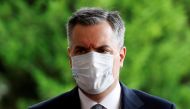 FILE PHOTO: Newly appointed Lebanese Prime Minister Mustapha Adib wears a protective face mask as he arrives to attend a meeting with French President Emmanuel Macron at the presidential palace in Baabda, Lebanon September 1, 2020. REUTERS/Gonzalo Fuentes