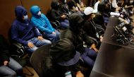 FILE PHOTO: Family members of twelve Hong Kong activists, detained as they reportedly sailed to Taiwan for political asylum, hold a news conference to seek help in Hong Kong, China September 12, 2020. REUTERS/Tyrone Siu
