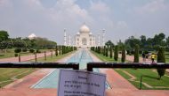 A notice is tied to a railing inside the premises of Taj Mahal after authorities reopened the monument for visitors, amidst the coronavirus disease (COVID-19) outbreak, in Agra, India, September 21, 2020. REUTERS/Alasdair Pal