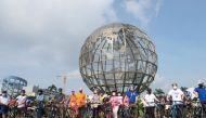 In this photo taken on September 26, 2020, people along with local government officials prepare to ride on bicycles during a launch ceremony encouraging people to take bicycles to their workplaces, at a mall in Manila. / AFP / AC Dimatatac