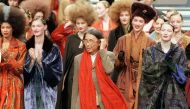 (FILES) In this file photo taken on March 13, 1998 Japanese fashion designer Kenzo (C) salutes the audience at the end of his's ready-to-wear Fall/Winter 1998/99 collection presentation in Paris.  / AFP / Joël SAGET

