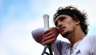 Germany's Alexander Zverev reacts as he plays against Italy's Jannik Sinner during their men's singles fourth round tennis match on Day 8 of The Roland Garros 2020 French Open tennis tournament in Paris on October 4, 2020. / AFP / Anne-Christine POUJOULAT