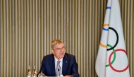 This handout picture taken and released by the Information Services of the International Olympic Committee (IOC) on October 7, 2020, shows IOC President Thomas Bach holding an executive board meeting at the IOC headquarters in Lausanne./ AFP / OIS/IOC / O