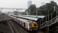 A suburban train is seen stalled at a railway platform during a power outage in Mumbai, India, October 12, 2020. REUTERS/Francis Mascarenhas