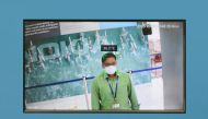 An undated Handout image shows an employee going through Nokia's automated COVID-19 detection system in Chennai, India. Nokia/Handout via REUTERS