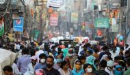 People are seen at a market amidst the spread of the coronavirus disease (COVID-19), in the old quarters of Delhi, October 19, 2020. REUTERS/Anushree Fadnavis
