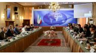 This picture taken on October 19, 2020 shows (L to R) delegations from Ukraine and Iran meeting in Tehran for the second round of talks on compensation for the families of victims of the Ukraine International Airlines Flight 752 crash. / AFP / ATTA KENARE
