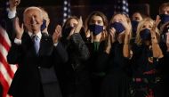 Democratic 2020 US presidential nominee Joe Biden and his family celebrate onstage at his election rally, after the news media announced that Biden has won the 2020 U.S. presidential election over President Donald Trump, in Wilmington, Delaware, U.S., Nov