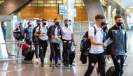 Perth Glory players arrive at the Hamad International Airport to take part in the AFC East Zone Champions League.  