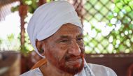 Sudan's top opposition leader and former prime minister Sadiq al-Mahdi, whose elected government was toppled in a 1989 Islamist-backed coup, speaks during an interview at his residence in Omdourman.  AFP / OZAN KOSE