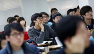 Young South Korean's attend a class at a cram school in a Goshichon, which means 