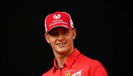 Racing driver Mick Schumacher attends an event to celebrate 90 years of Italian premium sports car maker Ferrari racing team at Milan's Duomo square, in Milan, Italy September 4, 2019. REUTERS/Flavio lo Scalzo/File Photo