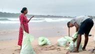 Residents prepare sandbags to protect their homes ahead of cyclone Burevi landfall in Sri Lanka's north-eastern coast, in Trincomalee on December 2, 2020. AFP / STR