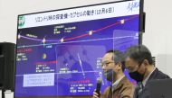 Yuichi Tsuda (L), Hayabusa2 project manager of the Japan Aerospace Exploration Agency (JAXA), answers questions at a press conference held before the return of the sample capsule of the Hayabusa 2 probe to the earth at JAXA Sagamihara Campus in Sagamihara