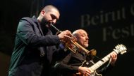 French-Lebanese trumpet player and composer Ibrahim Maalouf performs with guitarist Francois Delporte, as part of Beirut Chants Festival, in Beirut, Lebanon December 4, 2020. Reuters/Issam Abdallah