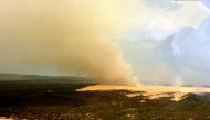 Vegetation burns from a bushfire on Fraser Island (K'gari), Queensland, Australia December 5, 2020 in this aerial picture obtained from social media. Save Fraser Islands Dingoes Inc via REUTERS