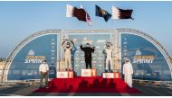 Qatar Motor and Motorcycle Federation (QMMF) President Abdulrahman Al Mannai and Executive Director Amro Al Hamad are seen with the overall winners of the Qatar National Sprint Championship. The fifth and final round of the season was held yesterday in Lo
