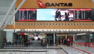 A mostly empty domestic terminal at Sydney Airport is seen after surrounding states shut their borders to New South Wales in response to an outbreak of the coronavirus disease (COVID-19) in Sydney, Australia, December 21, 2020. Reuters/Loren Elliott