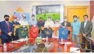Yousef Jeham Al Kuwari, President of the Qatar Cricket Association (QCA), Abdullah Aman Al Khater, QCA General Secretary, Isa Al Yaqoub, Director of the Public Relations Department, representatives of the participating teams, and other officials posing fo