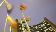 Flags flutter in the wind in front of the headquarters of the International Atomic Energy Agency (IAEA) in Vienna, Austria, December 16, 2020. Reuters/Lisi Niesner
