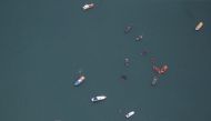 Ships and boats are pictured during a search for the Sriwijaya Air SJ-182, which crashed to the sea, in Jakarta, Indonesia, January 10, 2021. REUTERS/Willy Kurniawa