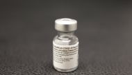 A vial of the Pfizer-BioNTech Covid-19 vaccine is seen at a coronavirus disease vaccination center. Reuters/Eric Gaillard/File Photo