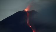 Mount Semeru volcano spews hot lava as it erupts, as seen from Oro-oro Ombo village in Lumajang, East Java province, Indonesia, January 17, 2021. Zabur Karuru/Antara Foto via REUTERS 