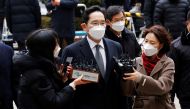 Samsung Group heir Jay Y. Lee arrives at a court in Seoul, South Korea, January 18, 2021. REUTERS/Kim Hong-Ji
