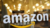 File photo: Logo of Amazon is seen on the door of an Amazon Books retail store. REUTERS/Brendan McDermid/File Photo