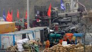 Rescuers work at the Hushan gold mine where workers were trapped underground after the Jauary 10 explosion, in Qixia, Shandong province, China January 22, 2021. Reuters/Aly Song
