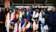 Nepali climbers who were the first to scale K2, the world's second tallest peak, in winter, cheer upon their arrival from the mountain, at Tribhuvan International Airport in Kathmandu, Nepal January 26, 2021. REUTERS/Navesh Chitrakar