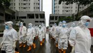 Healthcare workers prepare to treat patients at the emergency hospital for coronavirus disease (COVID-19) in Athletes Village, Jakarta, Indonesia January 26, 2021. REUTERS/Ajeng Dinar Ulfiana
