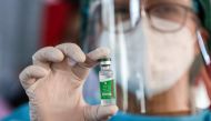 A medic shows a vial of AstraZeneca's COVISHIELD coronavirus disease (COVID-19) vaccine in Yangon, Myanmar, after the country received 1.5 million doses of the vaccine manufactured by the Serum Institute of India, January 27, 2021. REUTERS/Shwe Paw Mya Ti