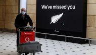 FILE PHOTO: A passenger arrives from New Zealand after the Trans-Tasman travel bubble opened overnight, following an extended border closure due to the coronavirus disease (COVID-19) outbreak, at Sydney Airport in Sydney, Australia, October 16, 2020. REUT