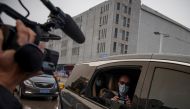 Peter Ben Embarek, a member of the World Health Organisation (WHO) team tasked with investigating the origins of the coronavirus (COVID-19) pandemic, leaves Baishazhou market in Wuhan, Hubei province, China, January 31, 2021. Reuters/Thomas Peter