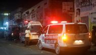 Ambulances are seen near the scene of a car bomb explosion in the Kilometre 4 area of Mogadishu, Somalia January 31, 2021. REUTERS/Feisal Omar