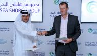 Salam Al Mohannadi, Chairman Seashore Qatar, with Michael Braidwood, General Manager of Education City Golf Club.