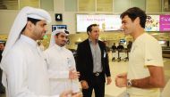 Qatar Tennis Federation President Nasser bin Ghanim Al Khelaifi welcoming Swiss tennis star Roger Federer ahead of the Qatar ExxonMobil Open in this January 2, 2011 file photo. 