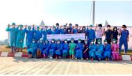 Healthcare workers pose for a picture at the Ayawaddy coronavirus disease (COVID-19) treatment center in Mandalay, Myanmar February 3, 2021. Prof Cho Mar Lwin