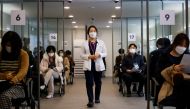 A nurse takes part in the coronavirus disease (COVID-19) vaccination mock drill at the COVID-19 vaccination center in Seoul, South Korea, February 9, 2021. REUTERS/Kim Hong-Ji/Pool