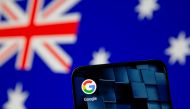 FILE PHOTO: Smartphone with Google app icon is seen in front of the displayed Australian flag in this illustration taken, Jan. 22, 2021. REUTERS/Dado Ruvic/Illustration/File Photo
