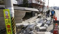 A collapsed wall by a strong earthquake is pictured in Kunimi, Fukushima Prefecture, Japan on February 14, 2021 in this photo taken by Kyodo. Kyodo/via Reuters