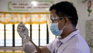 A health worker participates in a simulation for COVID-19 vaccination in preparation for its arrival, at an elementary school turned vaccination command center in Pasig City, Metro Manila, Philippines, February 16, 2021. REUTERS/Eloisa Lopez/File Photo