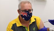 Australian Prime Minister Scott Morrison receives his COVID-19 vaccination during a visit to Castle Hill Medical Centre to preview the COVID-19 vaccination program on Sunday, in Sydney, Australia February 21, 2021. AAP Image/Joel Carrett/via Reuters